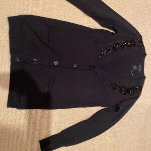 Sweater. button down, casual and fancy.  Marked M but really fits S better